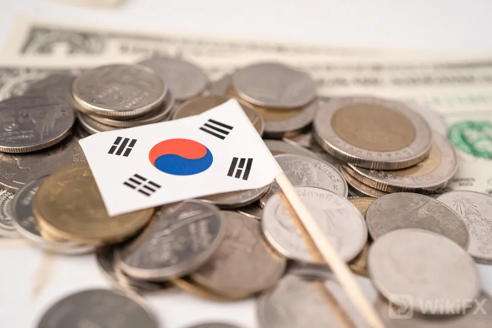 stack-coins-with-korea-flag-white-background-flag-white-background.jpg