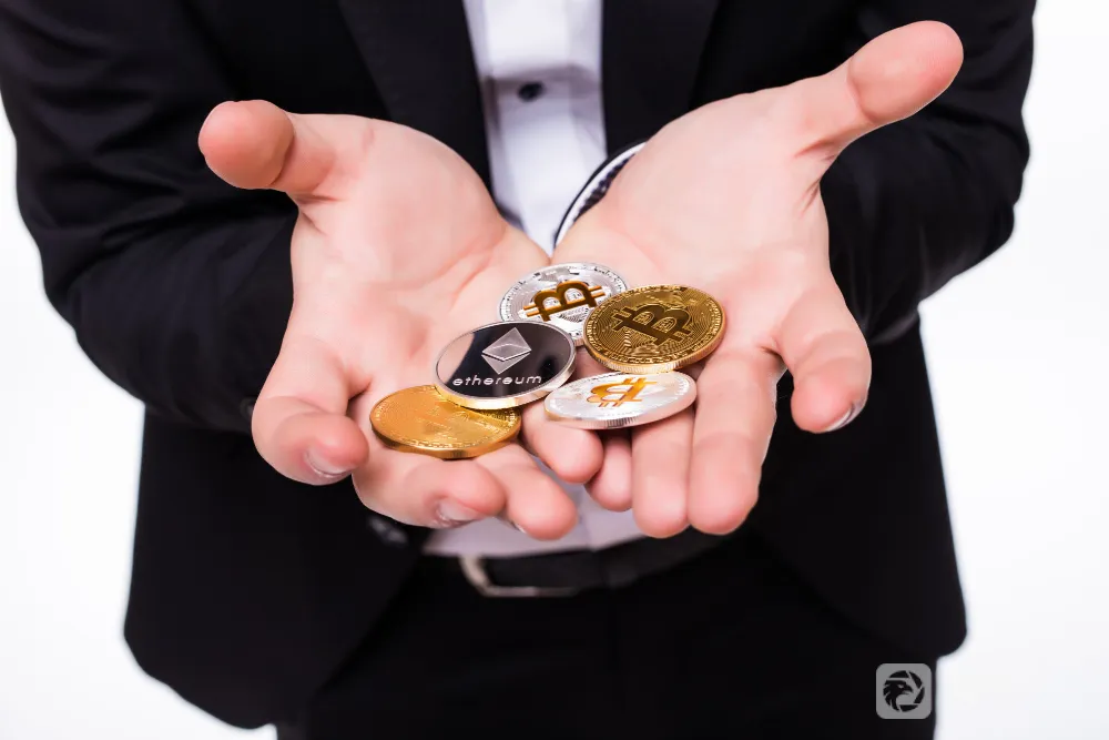 man-holds-different-crypto-coins-his-hands-white.jpg