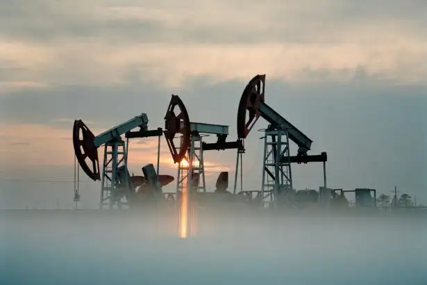 Oil takes wild ride, gold yawns