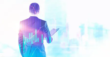Man with a writing board surrounded with a trading chart.png Man with a writing board surrounded with a trading chart.png
