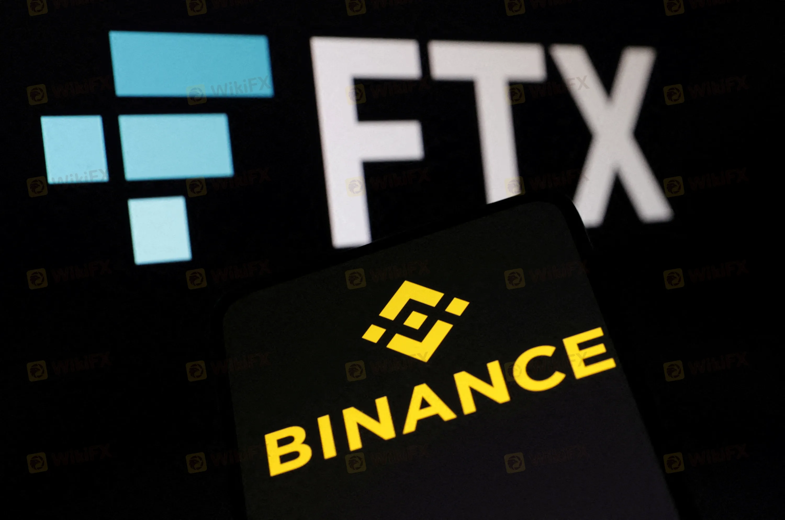 Crypto's FTX CEO looking at all options as Binance deal collapses | Reuters