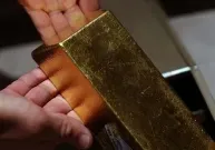 Ouro fecha em baixa, com avanço de juros dos Treasuries e do petróleo