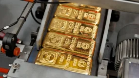 Vàng thế giới tăng gần 1% trước cuộc họp Fed